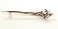 Lot 803 - A diamond set white metal sword pattern bar...