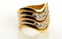 Lot 862 - An 18ct. gold diamond set ring, set with two...