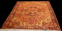 Lot 1198 - A mid 20th Century Heriz carpet, geometric...