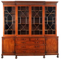 Lot 1321 - A large late George III mahogany bookcase,...
