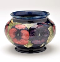 Lot 375 - Moorcroft 'Pansy' squat vase, with blue ground...