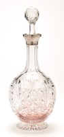 Lot 561 - An Elizabeth II cut glass decanter with silver...