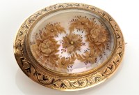 Lot 815 - A Victorian memorium brooch, the central...