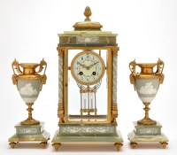 Lot 1093 - An onyx, brass and Jasper ware three-piece...