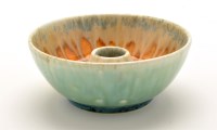 Lot 25 - Ruskin: a small flambé style candle holder,...