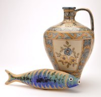 Lot 28 - An Algarve Pottery tin glaze jug, with floral...