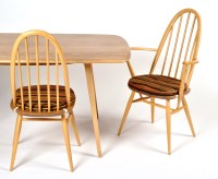 Lot 90 - An Ercol light elm and beech eight-piece...