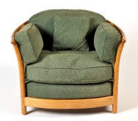 Lot 92 - Four modern light elm Ercol Renaissance low...