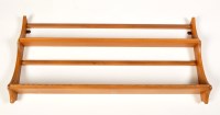 Lot 95 - An Ercol elm plate rack, 37 1/2in. wide.
