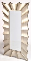 Lot 130 - A large bevelled wall mirror, with silvered...
