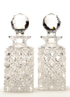 Lot 290 - A pair of hobnail cut square shaped decanters,...