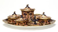 Lot 357 - Royal Crown Derby: a seven-piece Dressing...