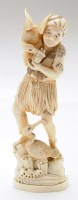 Lot 423 - A Japanese carved ivory okimono, Meji period...