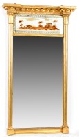 Lot 1152 - A Regency gilt wood pier glass, with verre...