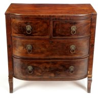 Lot 1251 - A William IV mahogany bowfront chest of two...