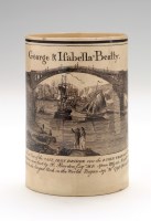 Lot 49 - Creamware transfer printed mug, with view of...