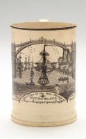 Lot 50 - Creamware transfer printed mug, with view of...