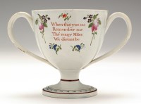 Lot 64 - Pearlware two-handled cup, painted with...