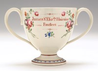 Lot 65 - Pearlware two-handled cup, enamel painted with...