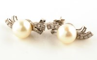 Lot 947 - A pair of cultured pearl and diamond earrings,...