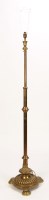 Lot 1293 - A brass standard lamp with adjustable tubular...