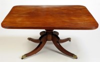 Lot 1346 - A late Regency rectangular mahogany tip-up-top...