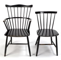Lot 55 - A set of four single and two arm ebonised...