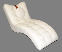 Lot 56 - A contemporary recliner chair of serpentine...
