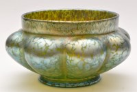 Lot 1017 - A Loetz style lobed circular dish, irredescent...