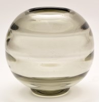 Lot 1031 - Orrefors: a pale green circular squat vase,...