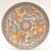 Lot 1051 - Charlotte Rhead for Crown Ducal: a circular...