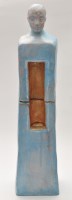 Lot 1054 - A surreal figure of a man, blue glaze, gold...