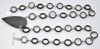 Lot 1106 - Hoorieh Coish: a moss agate and onyx necklace,...