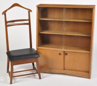 Lot 1127 - Herbert Gibbs: a teak cabinet, with glazed...