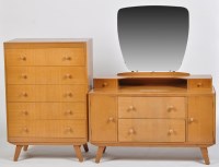 Lot 1128 - A light stained teak dressing table, with...