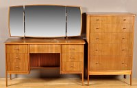 Lot 1146 - Vanson: a dark stained wood chest of five long...