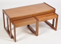 Lot 1186 - Sunelm: a teak nest of three occasional tables,...