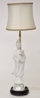 Lot 52 - Chinese 'Dehua' figure of Guanyin, mounted...