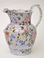 Lot 130 - Coloured printed 'ironstone' jug and footbath,...