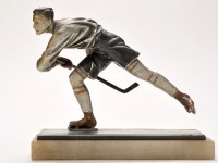 Lot 321 - An Art Deco patinated and silvered bronze...