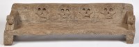 Lot 347 - A Naga Tribe carved teak seat, with skull...