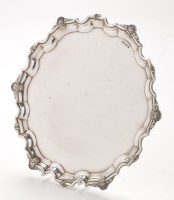 Lot 413 - A George V silver waiter, by Charles S. Green...