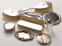 Lot 428 - A George V silver backed dressing set, by...