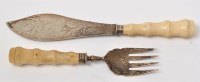 Lot 451 - A Victorian pair of silver fish servers, by...