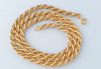 Lot 736 - An 18ct. yellow and white gold twist and box...