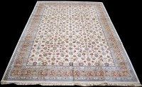 Lot 881 - A Kashmir carpet, with floral scrolling design...