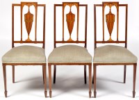 Lot 1001 - Three Edwardian inlaid mahogany Sheraton...