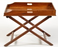 Lot 1020 - A 19th Century butler's mahogany tray on stand,...