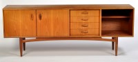 Lot 34 - G-Plan: a teak sideboard, fitted cupboard...