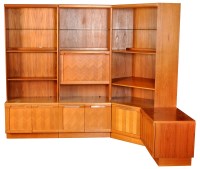 Lot 37 - G-Plan: a teak corner wall unit, the three...